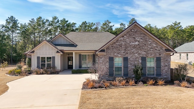 craftsman-style home with a front yard