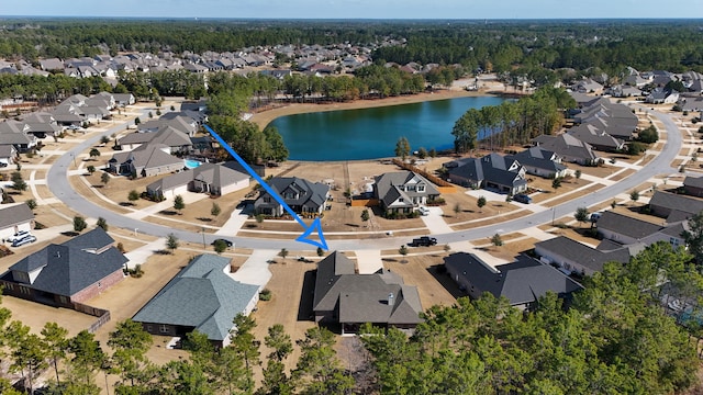 bird's eye view with a water view