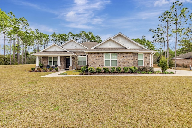 craftsman-style house with a front lawn