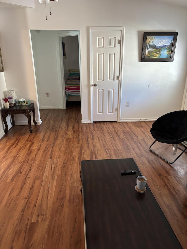 workout room featuring hardwood / wood-style floors