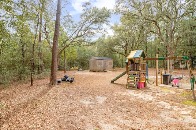 view of playground featuring a shed