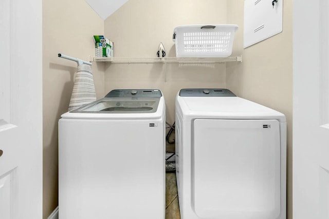 laundry room with independent washer and dryer