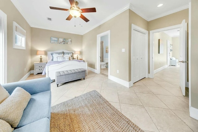 bedroom with ceiling fan, connected bathroom, ornamental molding, light tile patterned flooring, and a closet