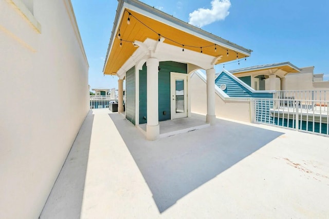 rear view of house featuring a patio