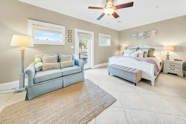 bedroom with light tile patterned floors, access to exterior, and ceiling fan