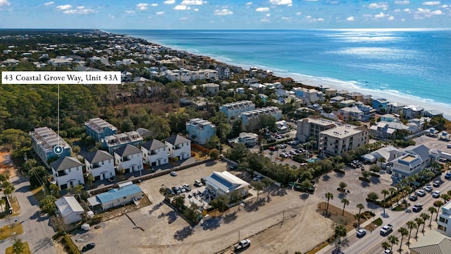 drone / aerial view with a view of the beach and a water view