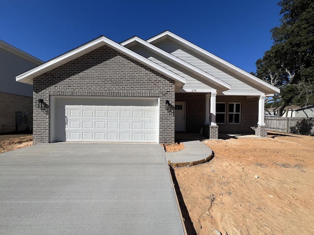 craftsman house with a garage