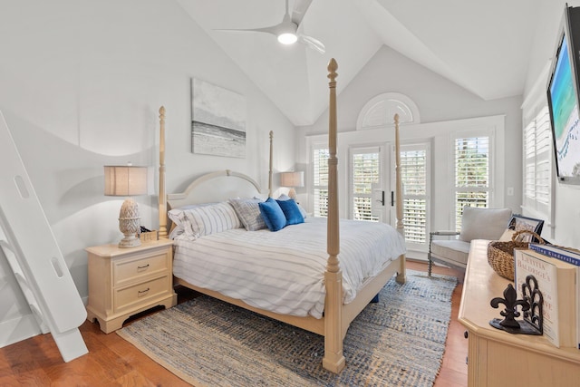 bedroom featuring vaulted ceiling, ceiling fan, light hardwood / wood-style floors, and access to outside