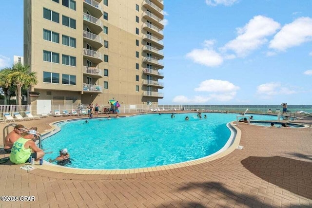 view of pool featuring a patio