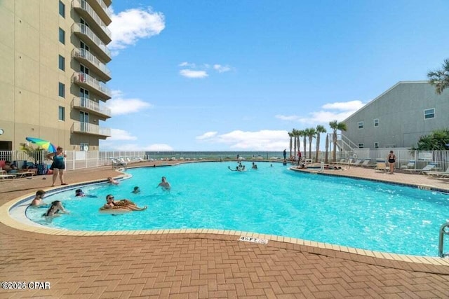 view of pool featuring a patio area