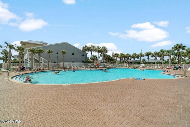 view of pool featuring a patio