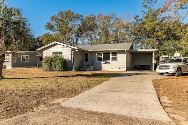 ranch-style home with a carport and a front yard