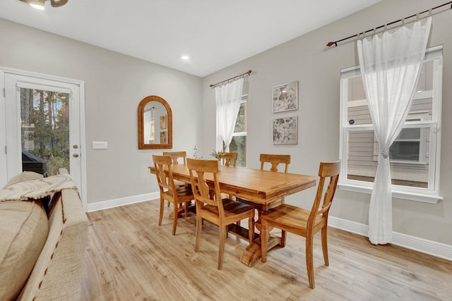 dining space featuring light hardwood / wood-style floors