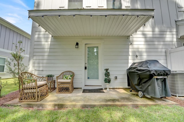 property entrance with central AC and a patio area