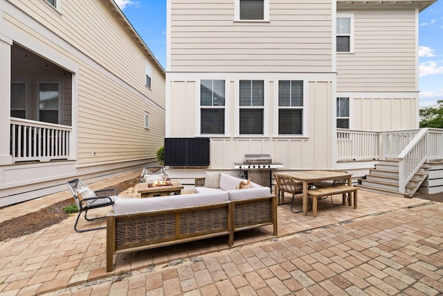 view of patio featuring area for grilling and an outdoor hangout area