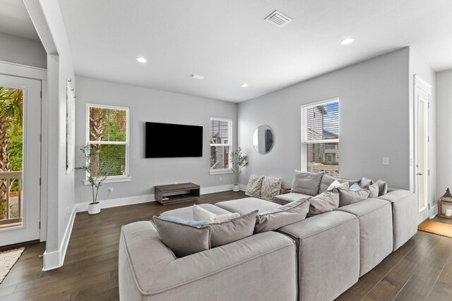 living room with dark wood-type flooring