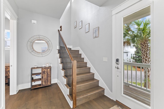 foyer with dark wood-type flooring