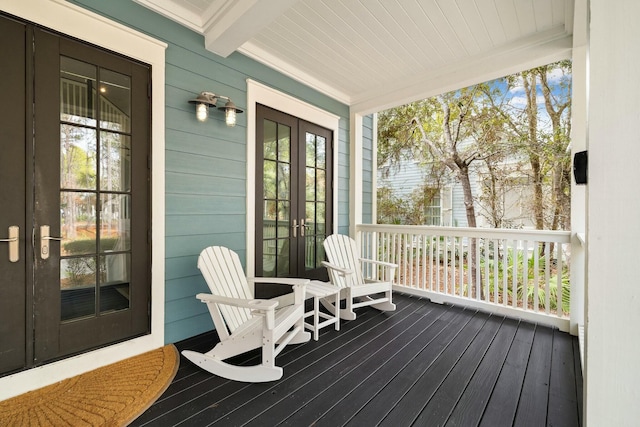 wooden deck with a porch