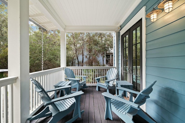 wooden deck featuring a porch