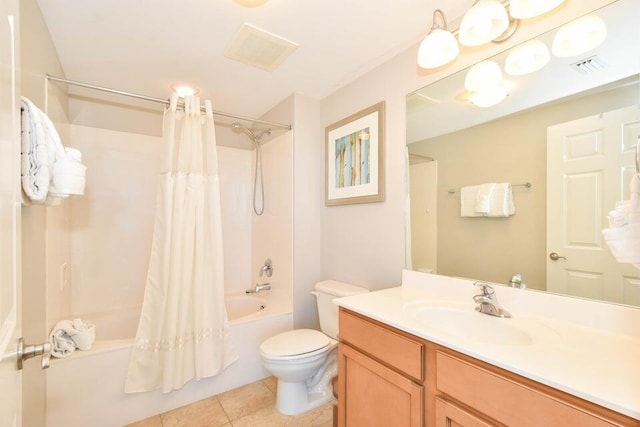 full bathroom featuring shower / tub combo with curtain, vanity, tile patterned flooring, and toilet