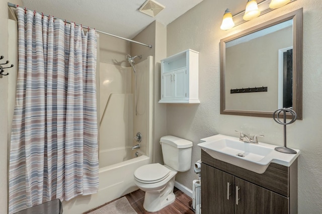 full bathroom with vanity, toilet, shower / tub combo, and wood-type flooring