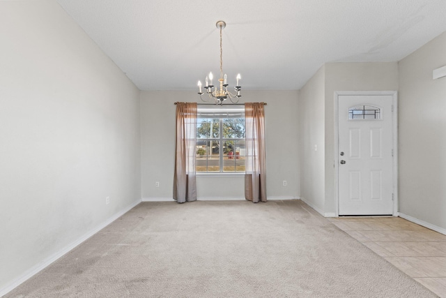 interior space featuring an inviting chandelier