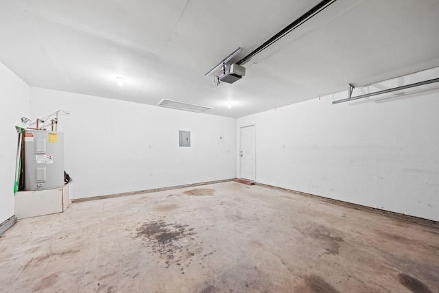 garage featuring a garage door opener and electric water heater