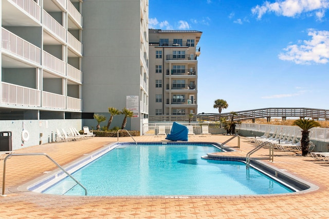 view of pool with a patio area