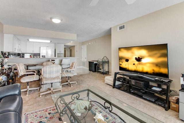 living room with light colored carpet