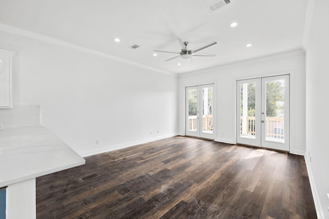 unfurnished living room featuring french doors, ceiling fan, crown molding, and dark wood-type flooring