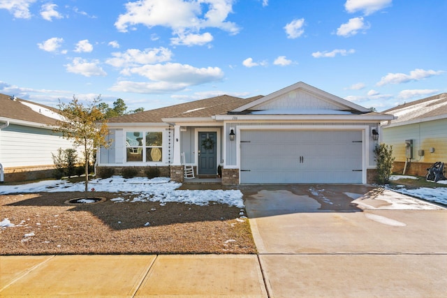 single story home with a garage