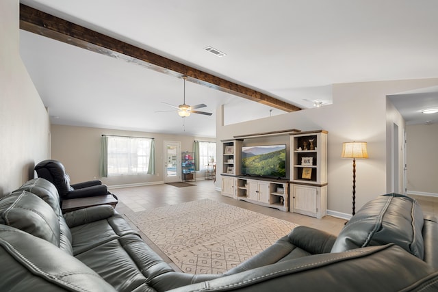 tiled living room featuring lofted ceiling with beams and ceiling fan