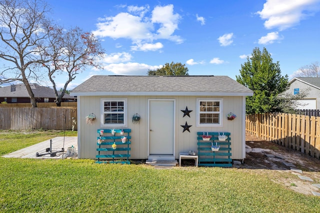 view of outdoor structure with a lawn