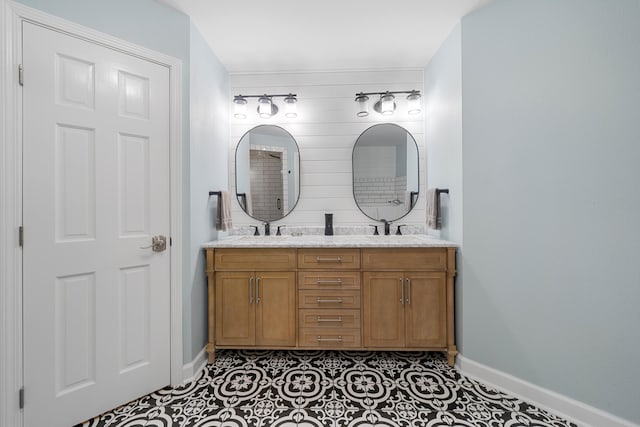 bathroom featuring tile patterned floors and vanity