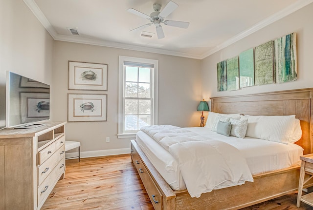 bedroom featuring crown molding, ceiling fan, and light wood-type flooring