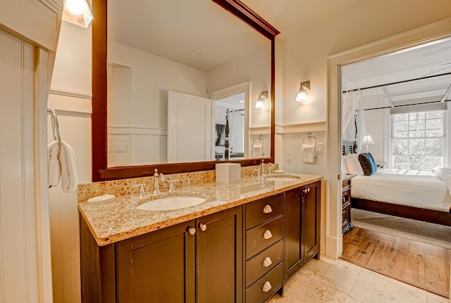 bathroom with vanity and tile patterned flooring