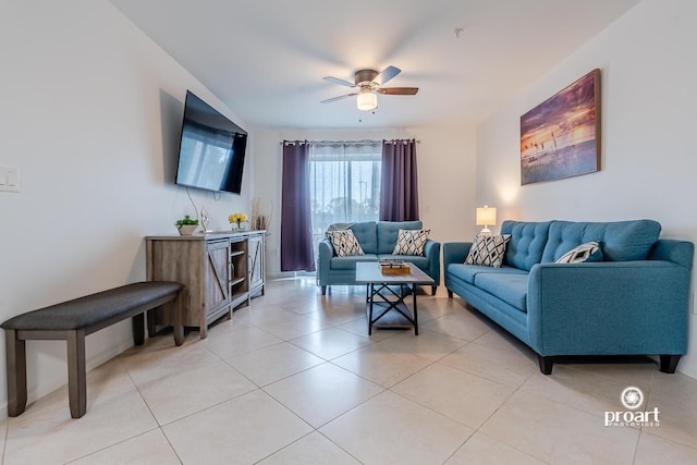 tiled living room featuring ceiling fan