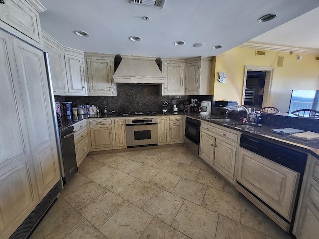 kitchen with sink, dishwasher, tasteful backsplash, custom range hood, and oven