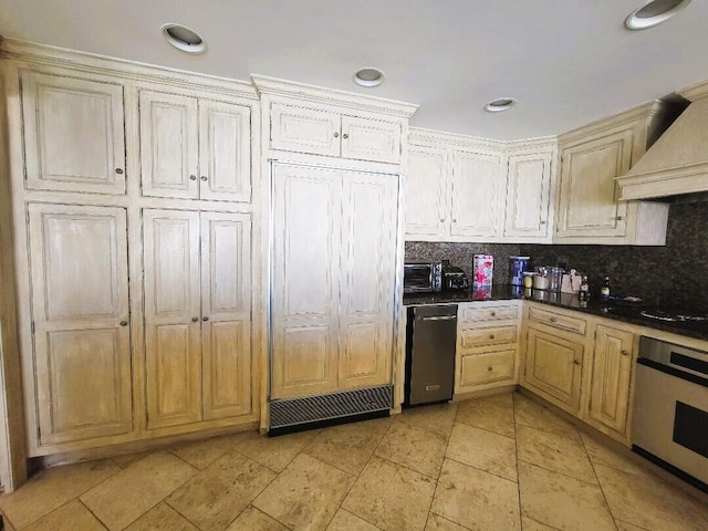 kitchen with wall oven, backsplash, custom exhaust hood, and black electric cooktop