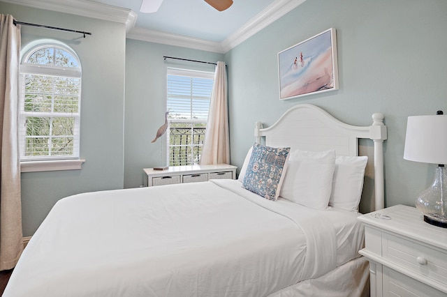 bedroom with crown molding and ceiling fan