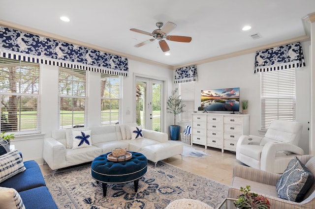 living room with ornamental molding, french doors, ceiling fan, and light tile patterned flooring