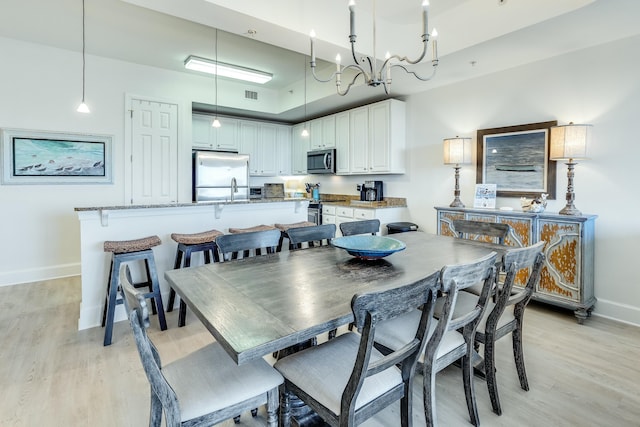 dining area featuring light hardwood / wood-style floors