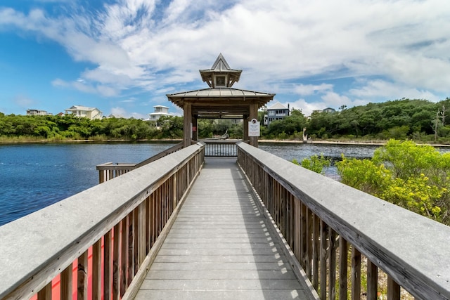 view of property's community featuring a gazebo and a water view