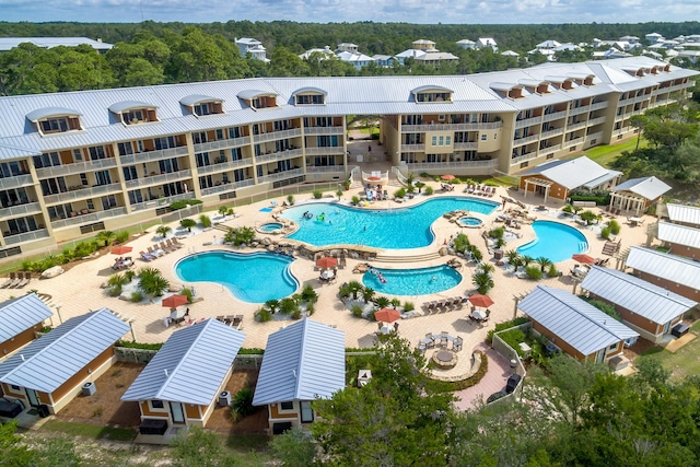 view of swimming pool with a patio area