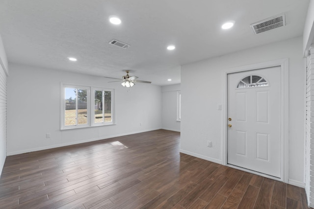 foyer featuring dark hardwood / wood-style floors and ceiling fan