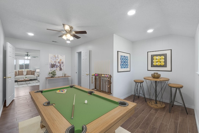 game room featuring dark hardwood / wood-style flooring, ceiling fan, pool table, and a textured ceiling