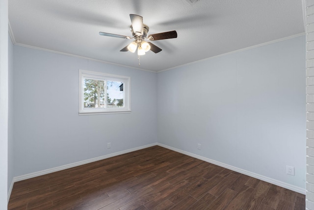 unfurnished room with crown molding, ceiling fan, and dark hardwood / wood-style flooring