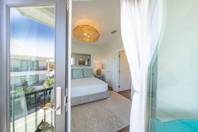 3986 W County Highway 30a Unit 231, Santa Rosa Beach, FL 32459 - bedroom with visible vents and wood finished floors