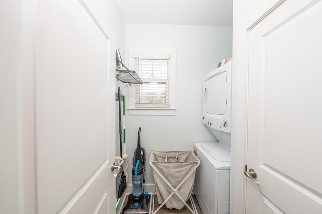 3986 W County Highway 30a Unit 231, Santa Rosa Beach, FL 32459 - laundry area with laundry area and stacked washer and clothes dryer