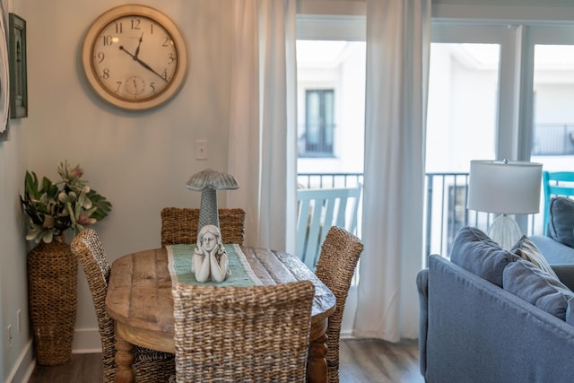 3986 W County Highway 30a Unit 231, Santa Rosa Beach, FL 32459 - dining space featuring wood finished floors and baseboards